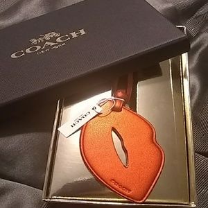 Coach red lips decorative tag